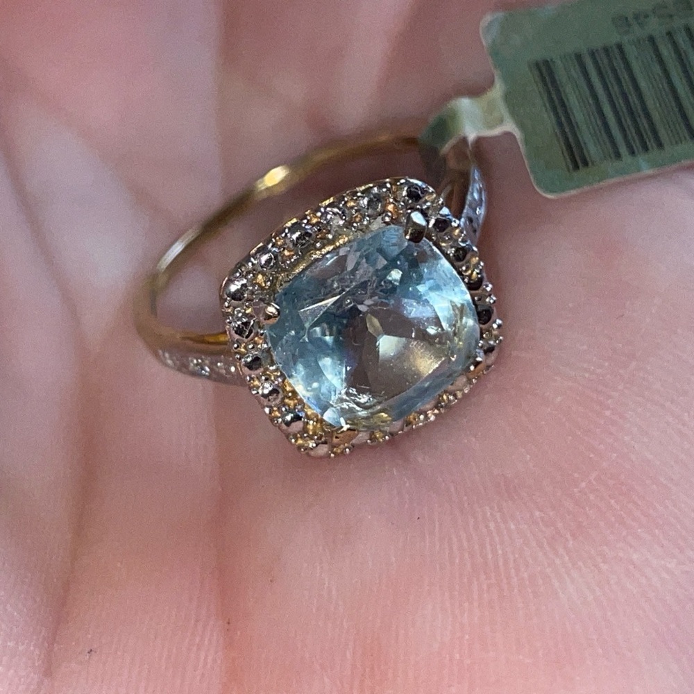 10k gold Topaz ring with small Diamonds.